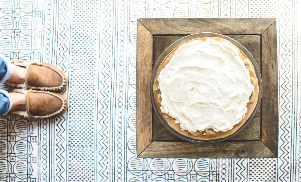 Finished pie topped with whip.