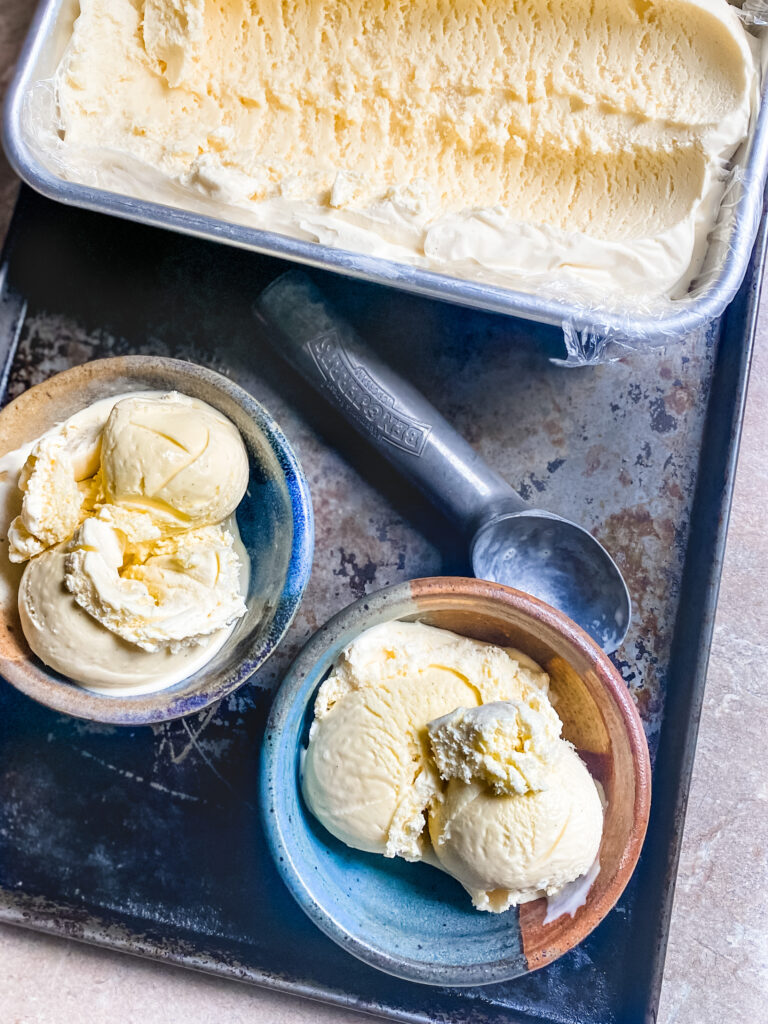 two bowls of scooped Extra Creamy Vanilla Ice Cream.