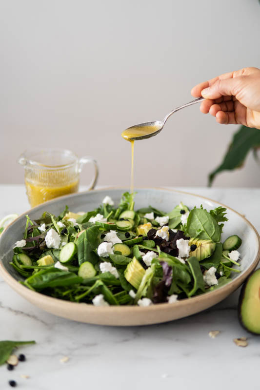 Later serving platter of Simple Side Salad with Lemon-Maple Vinaigrette.