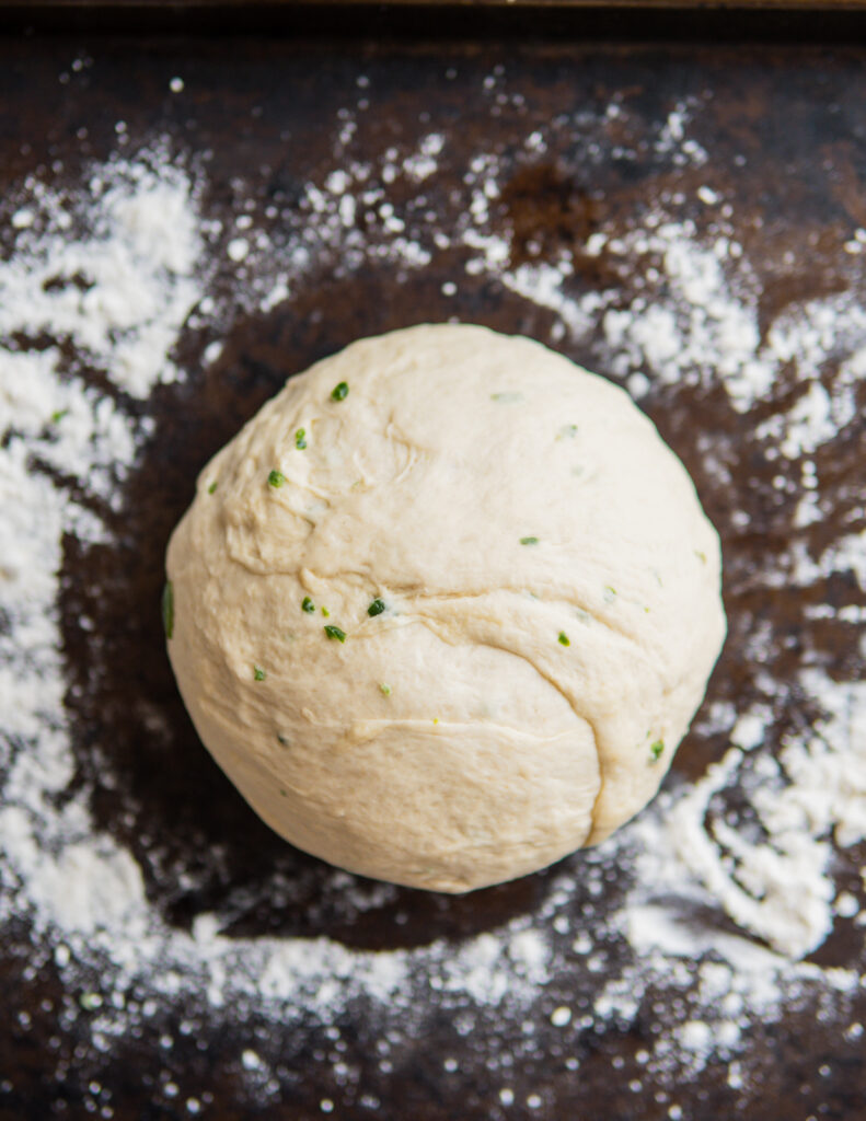 Smooth jalapeno dough on a lightly floured surface.