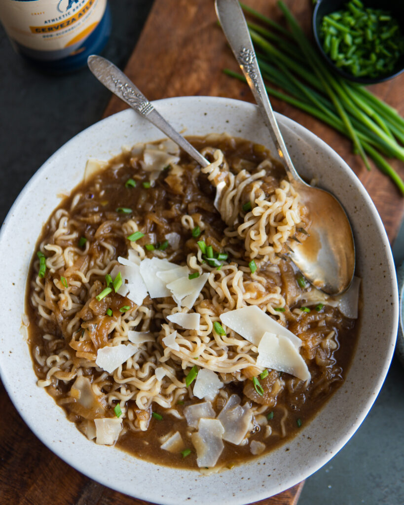 Plated bowl of Cerveza Atletica French Onion Ramen.