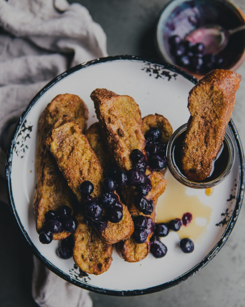 AirCrisp French Toast Sticks with Lemon Blueberries dipped in maple syrup. 