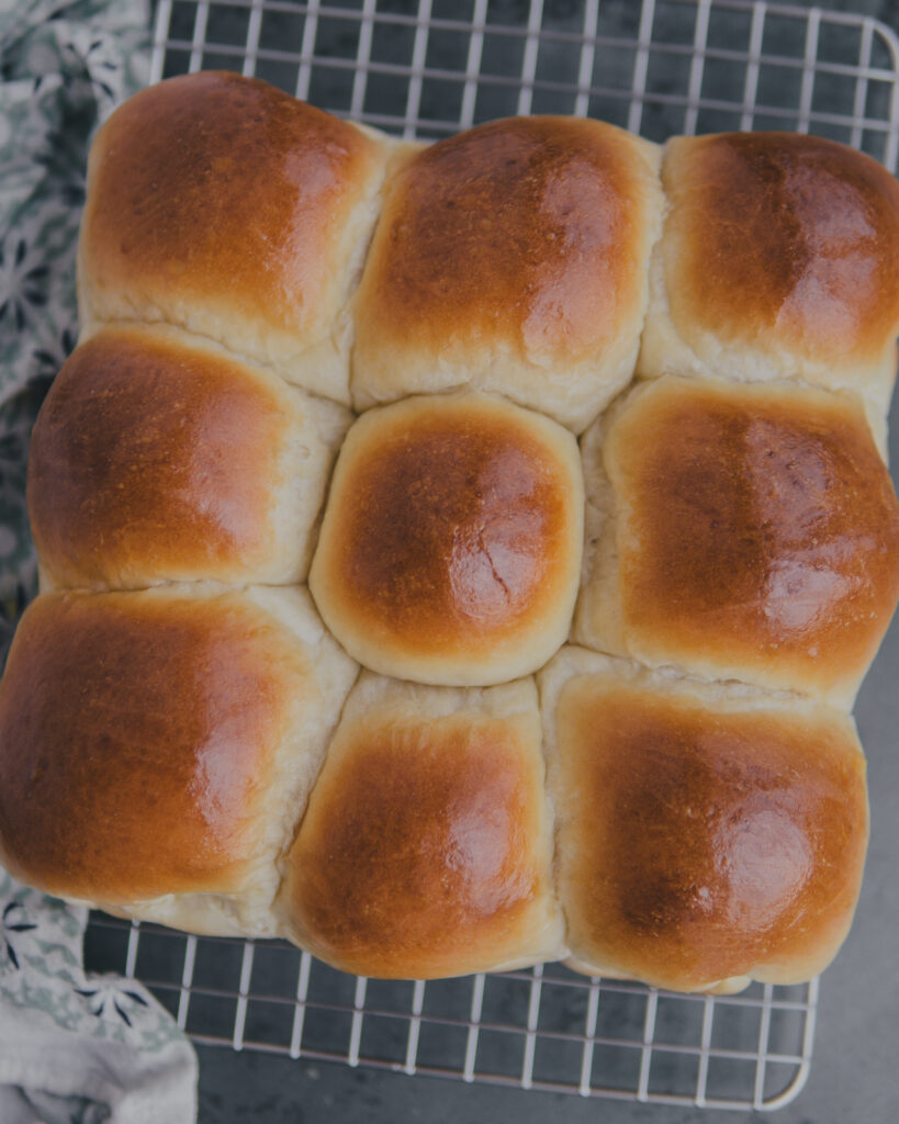 Salted Milk Buns on a cooling rack. 