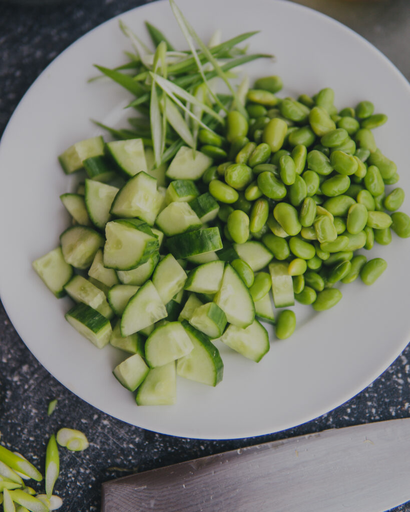 Toppings for your bowls: edamame, sliced green onions and cucumbers. 